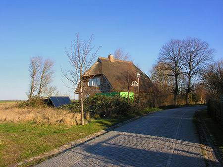 Foto Straße zum Dorf
